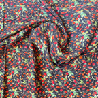 Betty Swaddle fabric close-up showing the print and texture