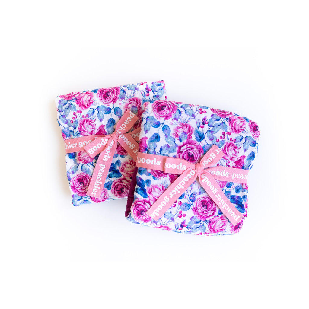 Pink floral printed swaddle blanket girls gift set wrapped in bows