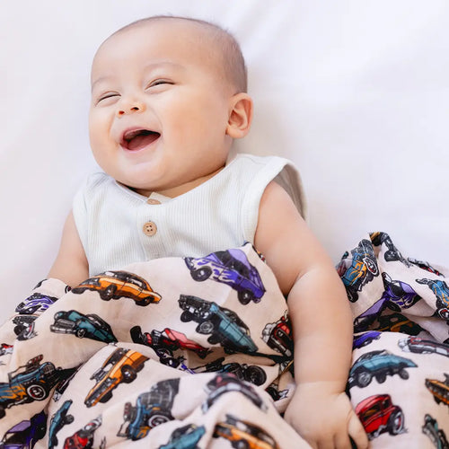 Axel vintage race car print muslin baby swaddle blanket in earth tones, boys car-themed nursery